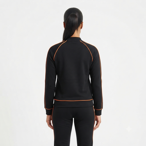 Survêtement sportif noir pour femme avec passepoil orange, manches longues, col rond, séchage rapide, coupe classique, idéal pour l'automne - Product Image 2