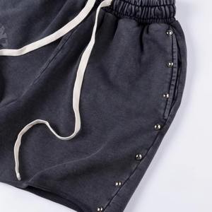 กางเกงขาสั้นทรงหลวมสบายๆ สำหรับผู้ชายผู้หญิง พร้อมหมุดย้ำด้านข้าง เอวยางยืด ดีไซน์เชือกผูก สตรีทแวร์ แฟชั่น กางเกงขาสั้นฤดูร้อน - Product Image 6