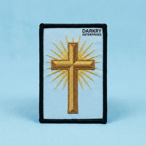 Custom Machine Embroidered Iron On Cross Patch religious symbol with golden rays <b>light</b> blue background black border for garments - Product Image 1