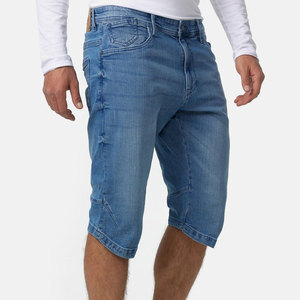 Shorts en jean premium pour homme, bleu indigo délavé, avec broderie géométrique et motifs rayonnants, coupe oversize, style streetwear - Product Image 4