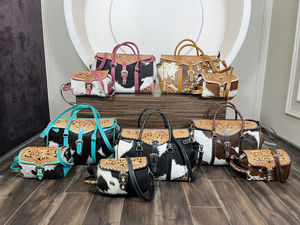 Bolsa de lona de viaje de piel de vaca mecanizada a mano de lujo de diseñador de marca con bolsa de cosméticos cruzada occidental conjunto de dos piezas a juego para mujer - Product Image 4