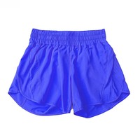 Shorts de sport jaune fluo pour femme, taille élastique, séchage rapide, tissu tricoté avec poches, coupe régulière, taille mi-haute, couleur unie