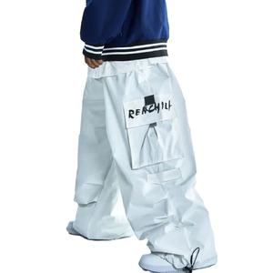 Pantalones de esquí impermeables y cortavientos de talla grande para hombre y mujer, pantalones holgados de snowboard, pantalones térmicos de invierno de cintura alta, pantalones cargo de estilo urbano - Product Image 2