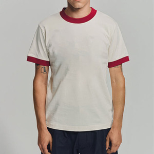 เสื้อยืดคอตตอนสีขาวน้ำหนักเบา แต่งขอบสีแดง แขนสั้น สำหรับผู้ชาย เสื้อยืดลำลอง เย็บทนทาน ผลิตในปากีสถาน - Product Image 1