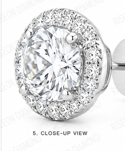 Elegant round halo diamond <b>stud</b> earrings with brilliant center stone surrounded by micro pave diamonds in polished white metal - Product Image 5