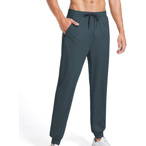 Pantalones deportivos de alto rendimiento que absorben la humedad para corredores profesionales y sesiones de entrenamiento de larga distancia - Product Image 1