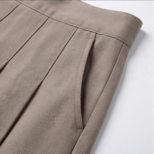 Jupe plissée mini pour femme, couleur unie, taille élastique, respirante, en polyester, à porter en toutes saisons - Product Image 5