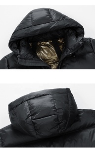 Vente en gros de manteaux d'hiver en duvet pour hommes, élégants et surdimensionnés, avec capuche imperméable, coupe ample, en fibre de polyester - Product Image 2