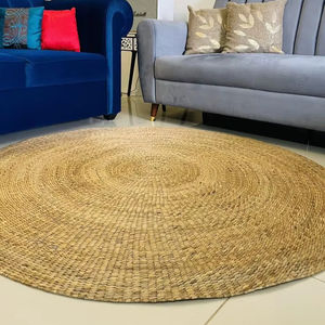 Tapis ronds bohèmes antidérapants en jacinthe d'eau naturelle, faits à la main et durables - Product Image 1