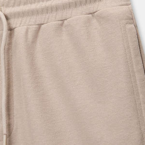 ชุดเสื้อยืดโอเวอร์ไซส์สีพื้นแขนสั้นพร้อมกางเกงขาสั้นสไตล์ลำลองแนวสตรีทแวร์ - Product Image 6