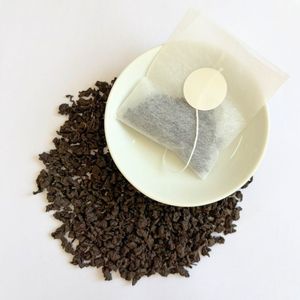 Nouveau thé oolong traditionnel de Taiwan, lourdement torréfié, en vrac, en sachet, avec des notes naturelles de sucre et de caramel, pour la vente en gros de boissons - Product Image 1