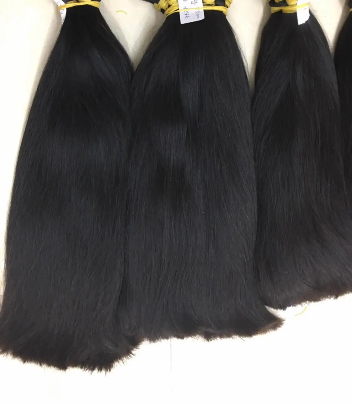 Superventas 2024 1B color natural recto extensiones de cabello a granel cabello crudo vietnamita al por mayor para mujeres trenzado de cabello