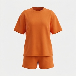 Ensemble décontracté 2 pièces tricoté pour femme : T-shirt orange uni à manches courtes et short au-dessus du genou, coupe ample, idéal printemps-été - Product Image 1