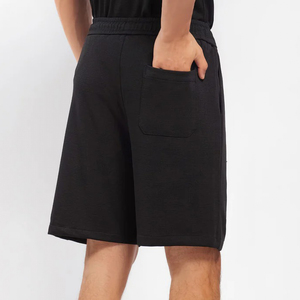 Pantalon de jogging décontracté pour homme en coton 100% de haute qualité, respirant, à taille élastique, avec logo personnalisé imprimé, noir uni, poids lourd - Product Image 2