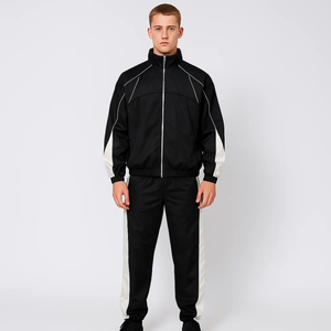 Survêtement noir pour homme, manches longues, col montant, fermeture éclair, coupe sportive, coupe régulière, vêtement d'automne, blocs de couleur, poches latérales, polyester - Product Image 1