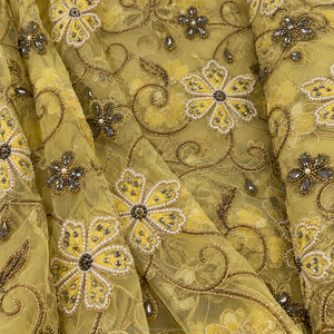 Tissu en dentelle brodé de perles, motif floral, design authentique et nouveau, pour robe décontractée, beauté intemporelle, luxe de la tradition nigériane - Product Image 1