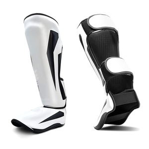 Protège-tibias de boxe professionnels blancs et noirs avec fermeture auto-agrippante, unisexe, pour adultes, équipement de protection léger et élastique en synthétique - Product Image 1