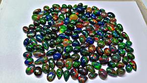 โอปอลเอธิโอเปียสีดำธรรมชาติทรงหลังเบี้ยเจียระไนแบบบริลเลียนท์ น้ำหนัก 3-5 กะรัต พร้อมใบรับรองจากผู้ตรวจสอบอิสระ เกรดท็อป สำหรับทำเครื่องประดับ - Product Image 2