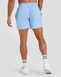 Shorts pour homme bleu clair, couleur unie, séchage rapide, avec poches élastiques à la taille, pantalon court décontracté, taille mi-haute, tissu tricoté - Product Image 3