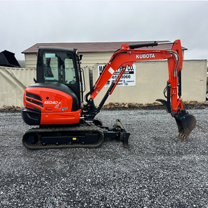 Mini-excavatrice KX018-4 orange sur chenilles en bon état de marche avec godet et lame, moteur 110 kW, garantie 1 an - Product Image 1