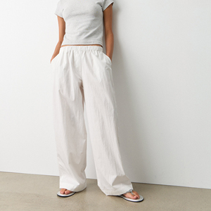 กางเกงโยคะเอวกลางสีขาวสำหรับผู้หญิง แห้งเร็ว ระบายอากาศได้ดี ผลิตจากไนลอน 100% มีเชือกผูกเอว สวมใส่สบาย ไซส์ใหญ่ กางเกงทรงหลวมสำหรับผู้หญิง - Product Image 5