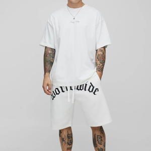 เสื้อยืดโอเวอร์ไซส์สไตล์โกธิคแบบสตรีทแวร์ทั่วโลก และชุดเดรสสองชิ้นแบบสตรีทแวร์พิมพ์ลายผ้าฝ้าย 100% ชุดเสื้อยืดและกางเกงขาสั้นสำหรับผู้ชาย - Product Image 1