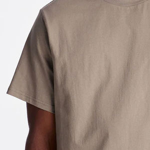 เสื้อยืดทรงบ็อกซี่ผ้าฝ้าย 100% หนานุ่ม สไตล์วินเทจ สีพื้น / รับออกแบบโลโก้ สำหรับผู้ซื้อจำนวนมาก สวมใส่สบายและทันสมัย - Product Image 3