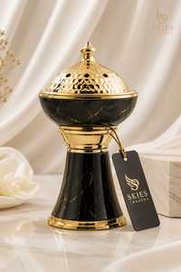 แท่นวางเครื่องหอมหินอ่อนสีดำและโลหะสีทอง - Product Image 1