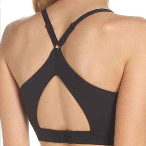 Sujetador deportivo sin costuras para mujer, con tirantes cruzados, cuello redondo, soporte medio, para yoga, color negro sólido, tela elástica transpirable - Product Image 5