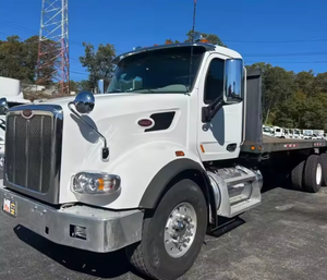 รถบรรทุกพื้นเรียบมือสองปี 2021 สำหรับ Peterbilt S567 ทนทาน พร้อมเกียร์ธรรมดา พร้อมส่งออกทั่วโลก - Product Image 1