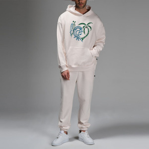 Ensemble de survêtement blanc à capuche pour homme, manches longues, taille élastique, poches latérales, tenue décontractée, coupe ample, motif imprimé, collection printemps - Product Image 1