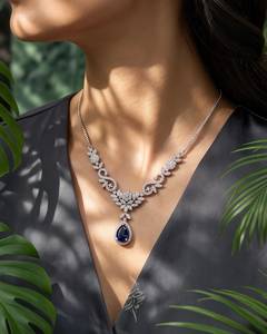 Parure de collier et boucles d'oreilles en titane plaqué or avec moissanite bleue, pendentif feuille élégant fait main pour mariage, demoiselle d'honneur, fête - Product Image 1