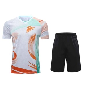 Uniforme de Voleibol Personalizado de Malla Transpirable con Estampado de Pinceladas en Blanco, Verde Menta y Naranja, de Secado Rápido, con Costuras en 4 Direcciones - Product Image 1