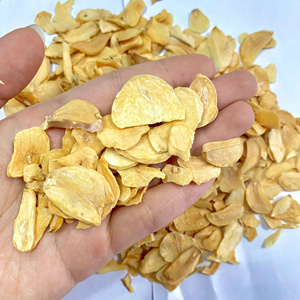 กระเทียมอบแห้งแบบเกล็ด ยี่ห้อ TINIMEX อายุการเก็บรักษา 1 ปี บรรจุภัณฑ์ 10 กก./ถุง ผลิตในเวียดนาม - Product Image 1