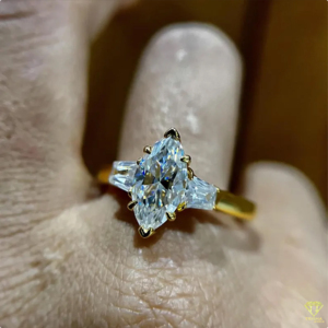 Elegant Marquise Cut Lab Grown Diamond Engagement <b>Ring</b> In Yellow Gold With Tapered Side Stones And Bridal Style - Product Image 5