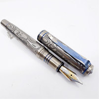 Stylo en acier de Damas, instrument d'écriture haut de gamme pour les professionnels et les entreprises.