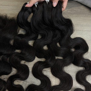 Cheveux vierges bruts vietnamiens de qualité supérieure, ondulation rapide, couleur naturelle, soyeux, tissage à double trame machine - Product Image 3