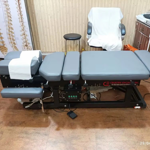 Table de chiropratique automatique haut de gamme à déplacement pneumatique, lit de physiothérapie électrique réglable en hauteur – Fournisseur en gros - Product Image 1