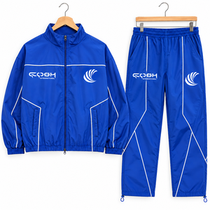 ชุดวอร์มสีน้ำเงินแบบ unisex เสื้อแจ็คเก็ตซิปเต็มตัว กางเกงขายาว แห้งเร็ว ผลิตจากโพลีเอสเตอร์ เหมาะสำหรับใส่ในฤดูใบไม้ร่วง ชุดกีฬา เสื้อแจ็คเก็ตและกางเกงเข้าชุด - Product Image 1
