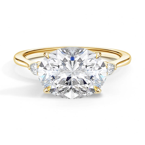 Anillo de Compromiso East-West Aria con Tres Piedras de Moissanita de Corte Ovalado y Engaste de Puntas Chapado en Oro de 14K para Boda y Aniversario - Product Image 1