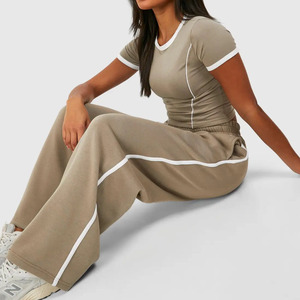 Nouvel arrivage : Ensemble décontracté deux pièces pour femme, coupe ample avec bande latérale, pantalon long en maille unie et haut à manches courtes - Product Image 4