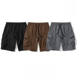 Alta calidad 100% poliéster múltiples bolsillos con cremallera Casual Bermudas Cargo pantalones cortos con cordón al por mayor personalizables para hombres - Product Image 1