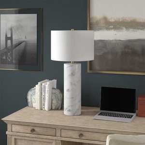 Lámpara de mesa de mármol de alta gama que exhibe una geometría cilíndrica suave, textura de mármol natural auténtica e iluminación ambiental superior. - Product Image 3
