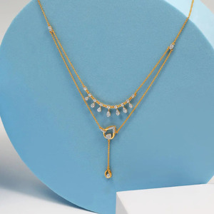 Layered Cascade Diamond <b>Necklace</b> with <b>Delicate</b> Hanging Drops and Elegant Leaf Inspired Center Design - Product Image 1