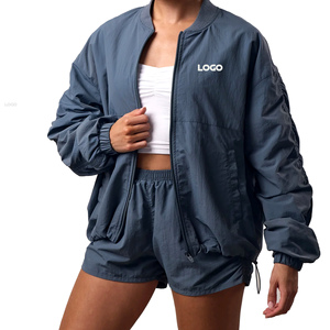 Ensemble short et blouson bomber femme deux pièces en tissu tissé imperméable écologique avec logo personnalisé Storm Blue, style streetwear, coupe ample, manches longues - Product Image 1
