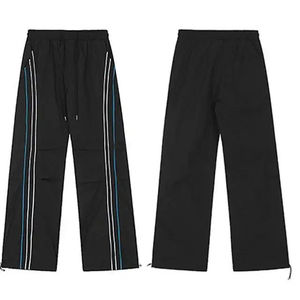 Pantalones de chándal casuales acampanados para hombre, novedad OEM, pantalones de nailon holgados con rayas laterales, pantalones rectos apilados - Product Image 1