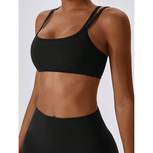 Soutien-gorge de sport noir sans coutures pour femme, col rond, bretelles croisées, maintien moyen, pour yoga, fitness et entraînement - Product Image 1