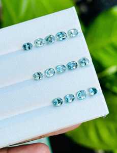 พลอยเพทายสีฟ้าธรรมชาติทรงรี รับรองโดย IGI น้ำหนักรวมเบา สำหรับทำเครื่องประดับ แหวน จี้ ต่างหู - Product Image 4