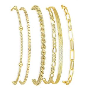 Set di Gioielli da Donna Trendy Impermeabili Placcati Oro 14K: Bracciali Sottili e Delicati, Impilabili, con Catena a Maglie Cubane e Graffetta - Product Image 1