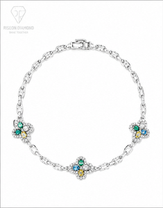 Elegante pulsera tipo station en oro blanco de 18 quilates con motivos florales y diamantes cultivados en laboratorio de colores vibrantes en tonos azul, amarillo y verde. - Product Image 3